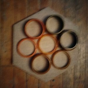 7 vintage bakelite bangles, some are carved